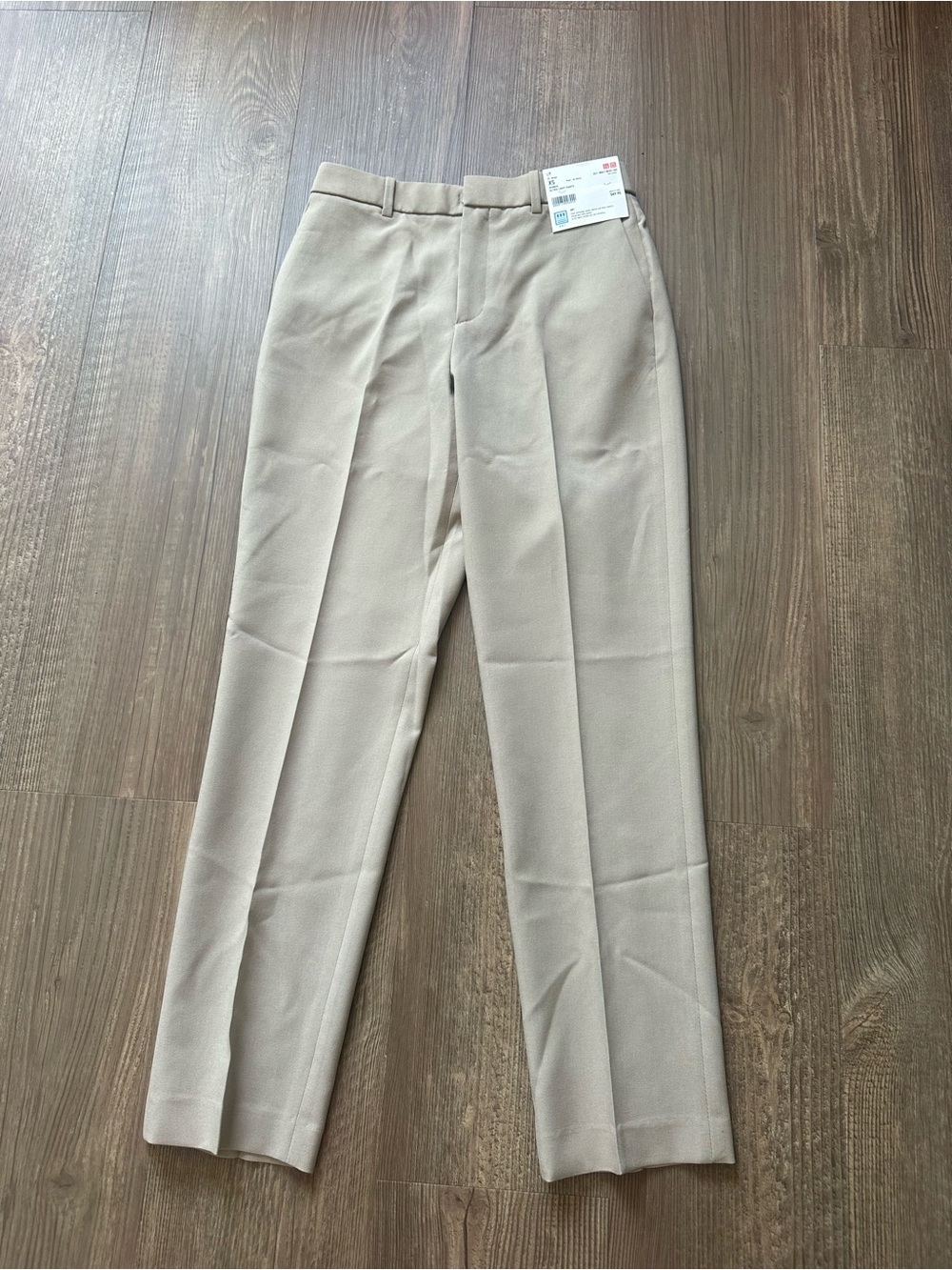 Uniqlo Smart Ankle Pants in beige.